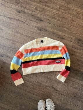 P.E NATION Cream Cropped Sweater with Red, Orange, Blue, Yellow & Black Stripes